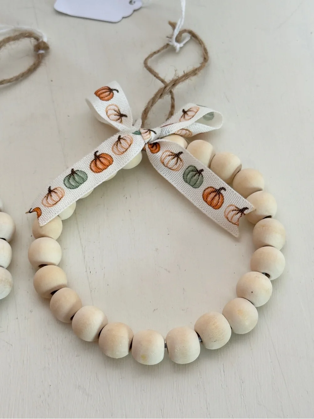 2 Handmade Wood Beaded Ornaments With Pumpkin Print Bow